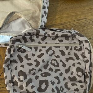 Calpak Brown Leopard Print Travel Bag